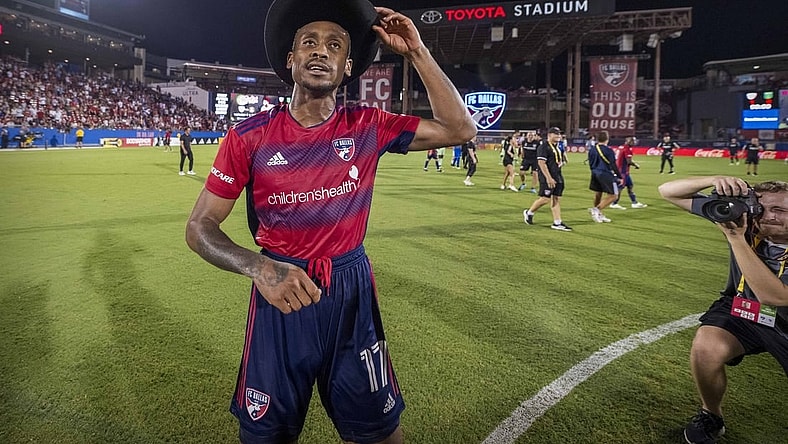 Aug 26, 2023; Frisco, Texas, USA; FC Dallas defender Nkosi Tafari (17) celebrates with the cowboy hat for being named man of the match in the victory over Austin FC at Toyota Stadium. Mandatory Credit: Jerome Miron-USA TODAY Sports