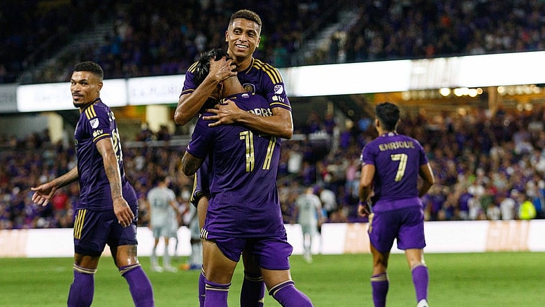 Aug 26, 2023; Orlando, Florida, USA; Orlando City SC midfielder Facundo Torres (17) and defender Rafael Santos (3) celebrate goal against St. Louis CITY SC in the second half at Exploria Stadium. Mandatory Credit: Morgan Tencza-USA TODAY Sports
