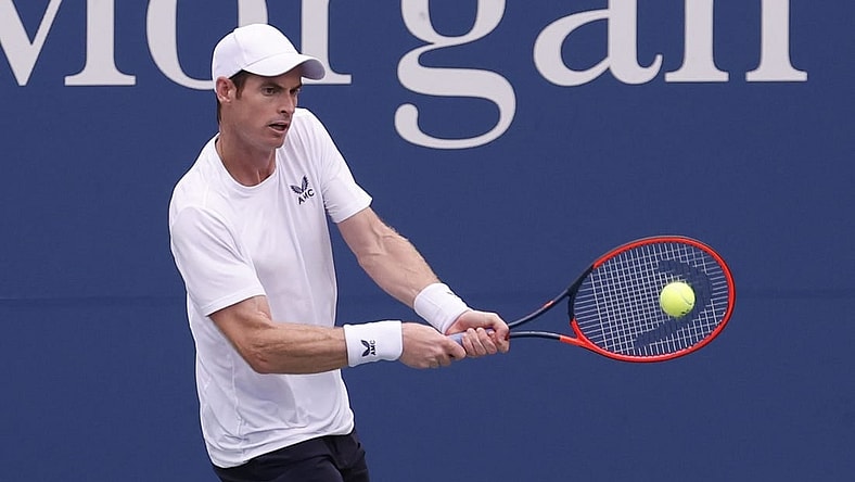 Aug 29, 2023; Flushing, NY, USA; Andy Murray of Great Britain hits a backhand against Corentin Moutet of France (not pictured) on day two of the 2023 U.S. Open tennis tournament at USTA Billie Jean King National Tennis Center. Mandatory Credit: Geoff Burke-USA TODAY Sports