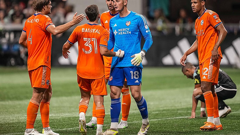 Aug 30, 2023; Atlanta, Georgia, USA; FC Cincinnati players react with goalkeeper Roman Celentano (18) after defeating Atlanta United at Mercedes-Benz Stadium. Mandatory Credit: Dale Zanine-USA TODAY Sports