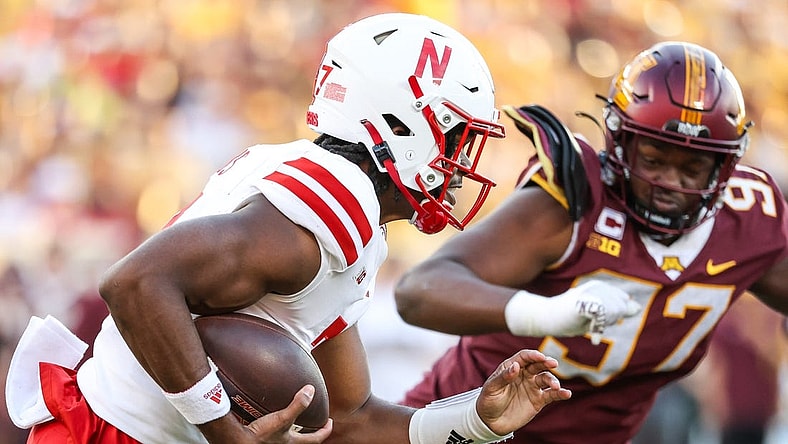 Aug 31, 2023; Minneapolis, Minnesota, USA; Nebraska Cornhuskers quarterback Jeff Sims (7) runs the ball against the Minnesota Golden Gophers during the first quarter at Huntington Bank Stadium. Mandatory Credit: Matt Krohn-USA TODAY Sports