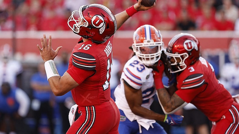 Aug 31, 2023; Salt Lake City, Utah, USA; Utah Utes quarterback Bryson Barnes (16) throws for a first half touchdown against the Florida Gators at Rice-Eccles Stadium. Mandatory Credit: Jeff Swinger-USA TODAY Sports