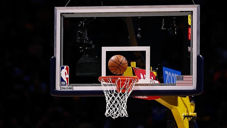 Dec 29, 2019; Denver, Colorado, USA; A general view of the NBA game ball being shot at the basket during a free throw attempt in the second quarter of the game between the Denver Nuggets and the Sacramento Kings at the Pepsi Center. Mandatory Credit: Isaiah J. Downing-USA TODAY Sports