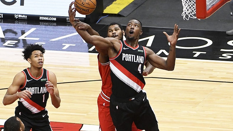 Jan 30, 2021; Chicago, Illinois, USA; Portland Trail Blazers forward Harry Giles III (4) grabs a rebound in front of Chicago Bulls forward Cristiano Felicio (6) during the first half at United Center. Mandatory Credit: David Banks-USA TODAY Sports