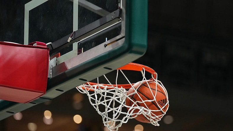 Dec 20, 2021; Coral Gables, Florida, USA; A general view as a basketball goes through the hoop as the Stetson Hatters warm up prior to the game against the Miami Hurricanes at Watsco Center. Mandatory Credit: Jasen Vinlove-USA TODAY Sports