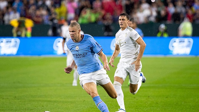 Manchester City forward Erling Haaland (9) runs the ball during the exhibition match against FC Bayern Munich on Saturday, July 23, 2022, at Lambeau Field in Green Bay, Wis.

Gpg Bayern Man City Match 7232022 0014