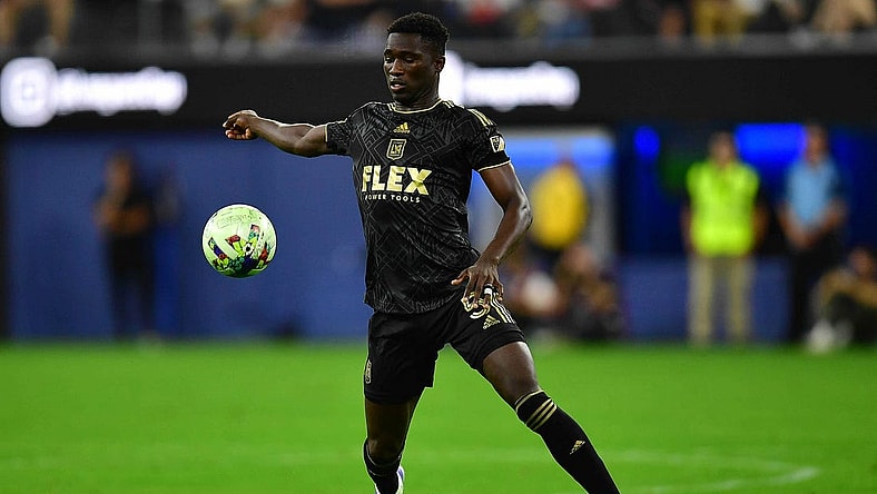 Aug 3, 2022; Los Angeles, California, US; LAFC defender Mamadou Fall (5) moves the ball against Club America during the first half at SoFi Stadium. Mandatory Credit: Gary A. Vasquez-USA TODAY Sports
