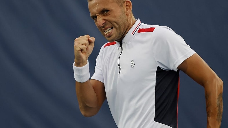 Aug 5, 2022; Washington, DC, USA; Daniel Evans (GBR) reacts after winning a point against Yoshihito Nishioka (JPN) (not pictured) on day five of the Citi Open at Rock Creek Park Tennis Center. Mandatory Credit: Geoff Burke-USA TODAY Sports