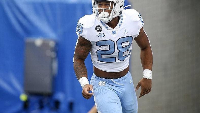 Sep 10, 2022; Atlanta, Georgia, USA; North Carolina Tar Heels running back Omarion Hampton (28) celebrates after a touchdown run against the Georgia State Panthers in the second half at Center Parc Stadium. Mandatory Credit: Brett Davis-USA TODAY Sports
