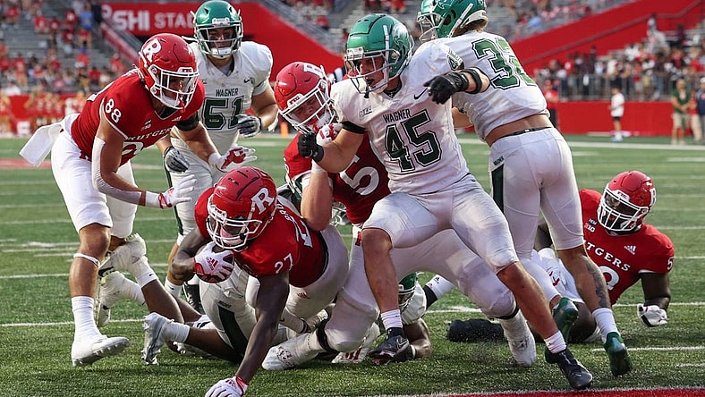 Sep 10, 2022; Piscataway, New Jersey, USA; Rutgers Scarlet Knights running back Samuel Brown V (27) runs for a touchdown against the Wagner Seahawks during the second half at SHI Stadium. Mandatory Credit: Ed Mulholland-USA TODAY Sports