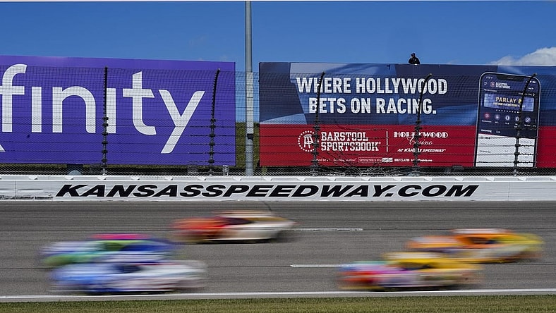 Sep 11, 2022; Kansas City, Kansas, USA; A general view of turn three as the field passes during the Hollywood Casino 400 at Kansas Speedway. Mandatory Credit: Jay Biggerstaff-USA TODAY Sports