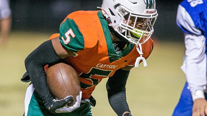 Eastside High School Micah Hudson (5) drives as Eastside travels to take on Belleview   Friday, Oct. 21, 2022, at Belleview High School in Belleview, Fla. [Alan Youngblood/Special to the Ocala Star-Banner]

Oca Eastside Vs Belleview Fb