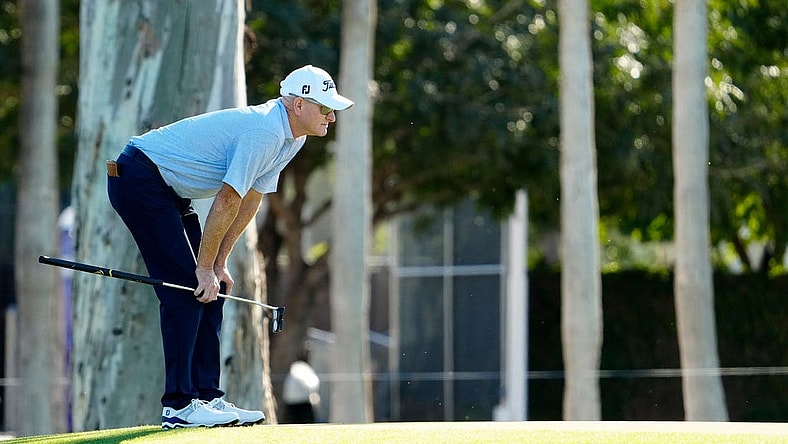 Steve Flesch looks over his putt on the ninth hole during round one of the Charles Schwab Cup at Phoenix Country Club. Mandatory Credit: Rob Schumacher-USA TODAY Sports