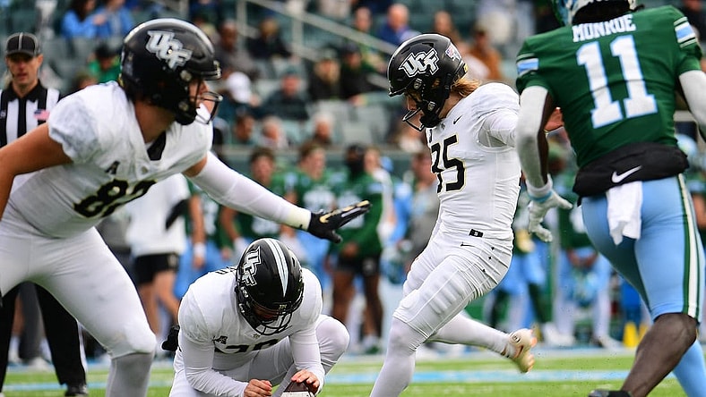 Nov 12, 2022; New Orleans, Louisiana, USA; UCF Knights place kicker Colton Boomer (35) kicks a field goal following a touchdown during the first quarter against the Tulane Green Wave at Yulman Stadium. Mandatory Credit: Rebecca Warren-USA TODAY Sports