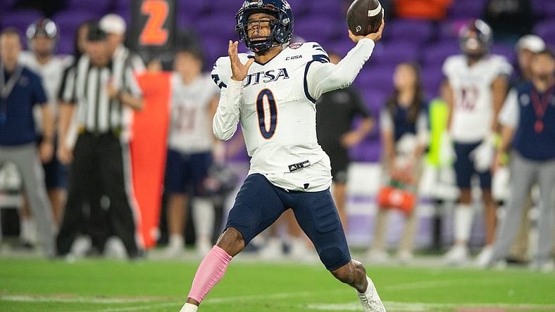 Dec 16, 2022; Orlando, Florida, USA; UTSA Roadrunners quarterback Frank Harris (0) throws the ball against the Troy Trojans in the third quarter at Exploria Stadium. Mandatory Credit: Jeremy Reper-USA TODAY Sports