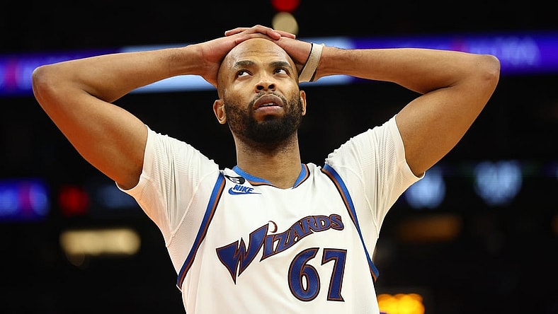 Dec 20, 2022; Phoenix, Arizona, USA; Washington Wizards forward Taj Gibson (67) reacts against the Phoenix Suns in the second half at Footprint Center. Mandatory Credit: Mark J. Rebilas-USA TODAY Sports