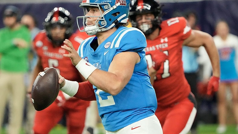 Dec 28, 2022; Houston, Texas, USA; Mississippi Rebels quarterback Jaxson Dart (2) scrambles from Texas Tech Red Raiders in the second half in the 2022 Texas Bowl at NRG Stadium. Mandatory Credit: Thomas Shea-USA TODAY Sports