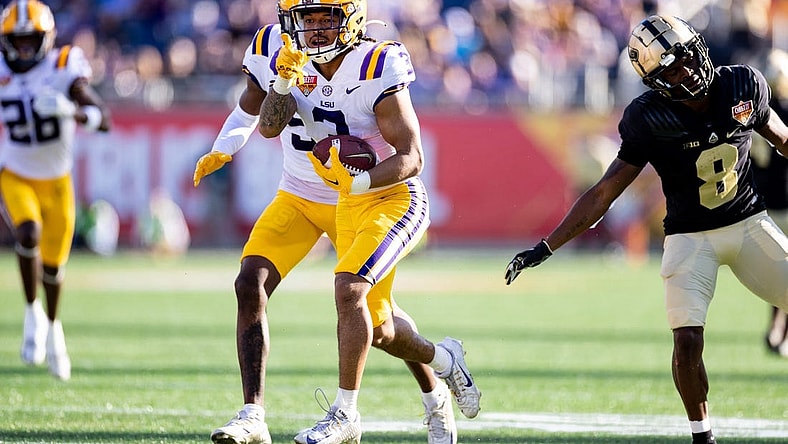 Jan 2, 2023; Orlando, FL, USA; LSU Tigers safety Greg Brooks Jr. (3) gestures after an interception during the second half against the Purdue Boilermakers at Camping World Stadium. Mandatory Credit: Matt Pendleton-USA TODAY Sports