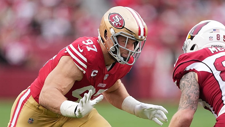 Jan 8, 2023; Santa Clara, California, USA; San Francisco 49ers defensive end Nick Bosa (97) rushes against Arizona Cardinals tight end Trey McBride (85) during the third quarter at Levi's Stadium. Mandatory Credit: Darren Yamashita-USA TODAY Sports