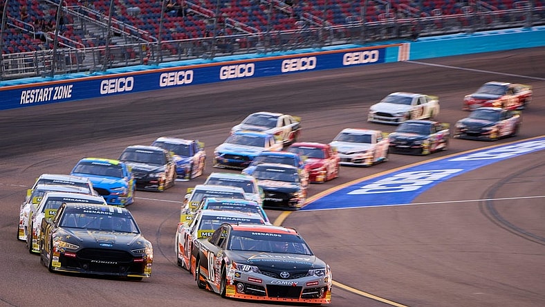 Mar 10, 2023; Avondale, AZ, USA; NASCAR ARCA Menards Series driver William Sawalich (18) leads the pack through turn 4 during the ARCA Menards General Tire 150 on Friday, March 10, 2023, at Phoenix Raceway. Mandatory Credit: Alex Gould/The Republic

Nascar Araca Race At Phoenix Raceway