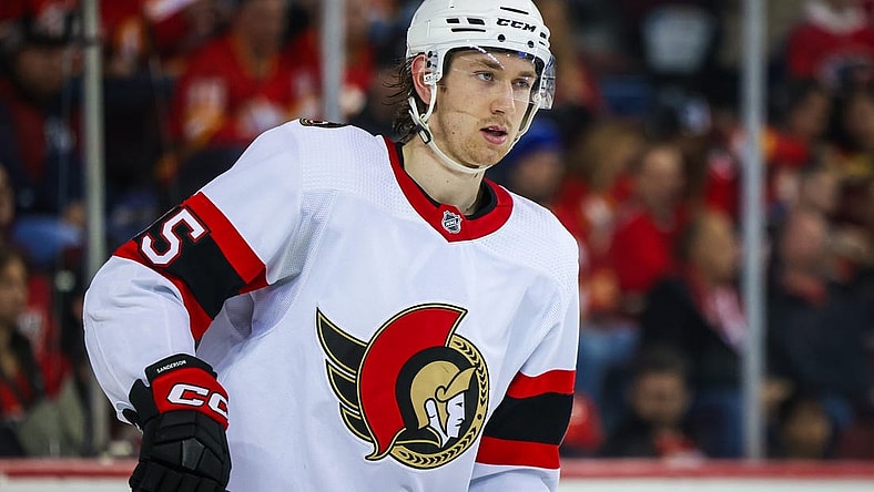 Mar 12, 2023; Calgary, Alberta, CAN; Ottawa Senators defenseman Jake Sanderson (85) skates against the Calgary Flames during the second period at Scotiabank Saddledome. Mandatory Credit: Sergei Belski-USA TODAY Sports