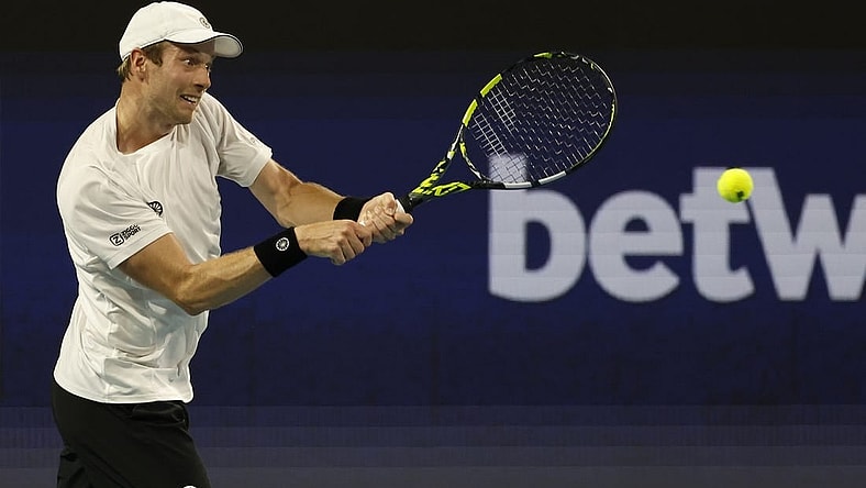 Mar 26, 2023; Miami, Florida, US; Botic van de Zandschulp (NED) hits a backhand against Casper Ruud (NOR) (not pictured) on day seven of the Miami Open at Hard Rock Stadium. Mandatory Credit: Geoff Burke-USA TODAY Sports
