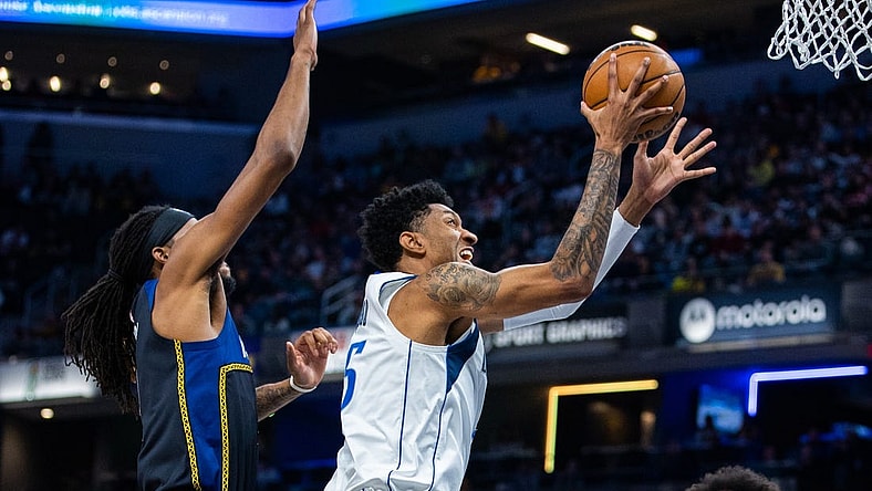 Mar 27, 2023; Indianapolis, Indiana, USA; Dallas Mavericks forward Christian Wood (35) shoots the ball while Indiana Pacers forward Isaiah Jackson (22) defends in the first quarter at Gainbridge Fieldhouse. Mandatory Credit: Trevor Ruszkowski-USA TODAY Sports