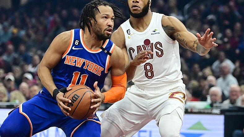 Mar 31, 2023; Cleveland, Ohio, USA; New York Knicks guard Jalen Brunson (11) drives to the basket against Cleveland Cavaliers forward Lamar Stevens (8) during the first half at Rocket Mortgage FieldHouse. Mandatory Credit: Ken Blaze-USA TODAY Sports