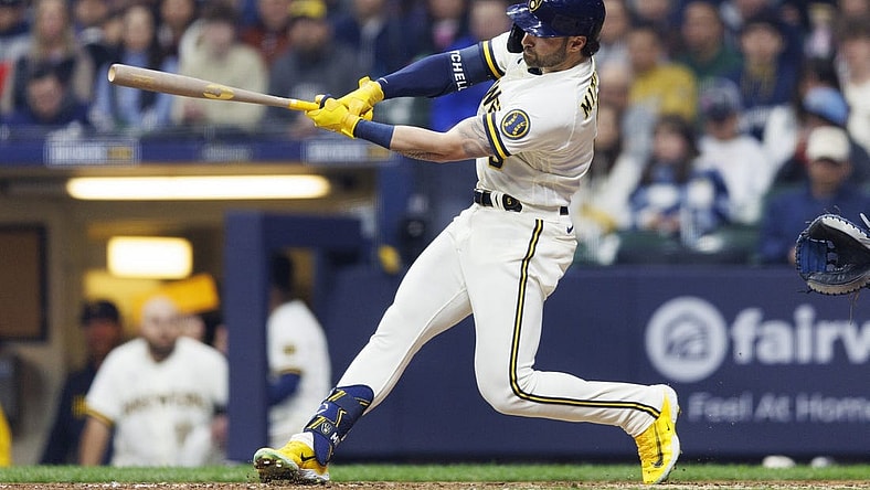 Apr 4, 2023; Milwaukee, Wisconsin, USA; Milwaukee Brewers center fielder Garrett Mitchell (5) hits a home run during the seventh inning against the New York Mets at American Family Field. Mandatory Credit: Jeff Hanisch-USA TODAY Sports