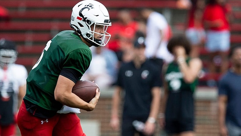 Cincinnati Bearcats quarterback Ben Bryant (6) runs toward the end zone during the Cincinnati Bearcats spring scrimmage at Nippert Stadium on Saturday, April 15, 2023.

Cincinnati Bearcats Football Spring Game April 15 2023