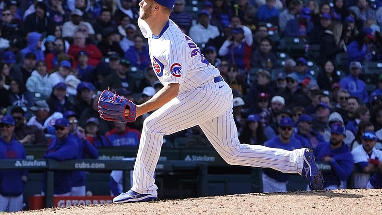 Apr 27, 2023; Chicago, Illinois, USA; Chicago Cubs relief pitcher Brad Boxberger (25) throws against the San Diego Padres during the ninth inning at Wrigley Field. Mandatory Credit: David Banks-USA TODAY Sports