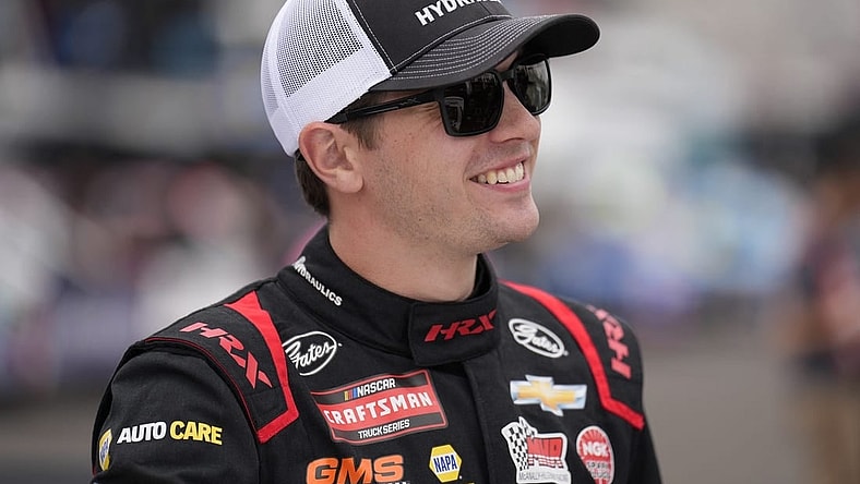 May 19, 2023; North Wilkesboro, North Carolina, USA; NASCAR Camping World Truck Series driver Christian Eckes smiles before truck practice at North Wilkesboro Speedway. Mandatory Credit: Jim Dedmon-USA TODAY Sports