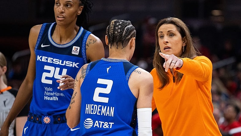 May 19, 2023; Indianapolis, Indiana, USA; Connecticut Sun head coach Stephanie White talks with guard Natisha Hiedeman (2) in the first half against the Indiana Fever at Gainbridge Fieldhouse. Mandatory Credit: Trevor Ruszkowski-USA TODAY Sports