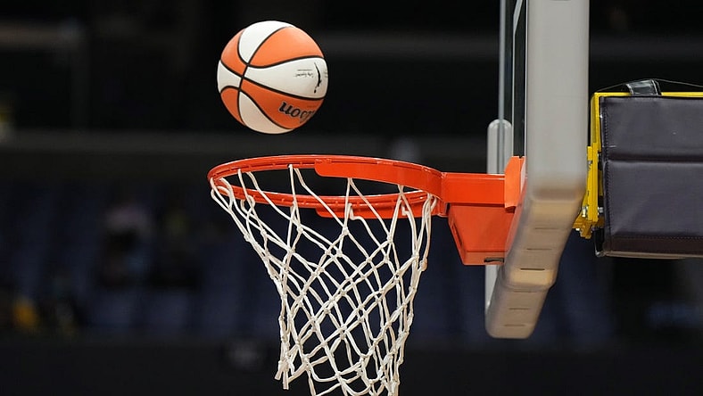 May 25, 2023; Los Angeles, California, USA; Wilson official basketball with WNBA logo goes through the net during the game between the LA Sparks and the Las Vegas Aces at Crypto.com Arena. Mandatory Credit: Kirby Lee-USA TODAY Sports