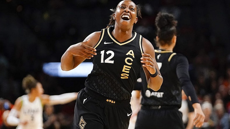 May 28, 2023; Las Vegas, Nevada, USA; Las Vegas Aces guard Chelsea Gray (12) reacts after scoring against the Minnesota Lynx during the first quarter at Michelob Ultra Arena. Mandatory Credit: Lucas Peltier-USA TODAY Sports