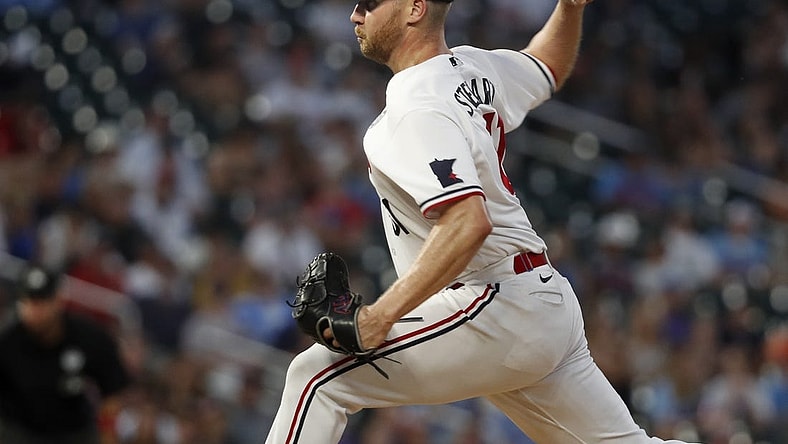 Jun 2, 2023; Minneapolis, Minnesota, USA; Minnesota Twins relief pitcher Brock Stewart (61) throws to the Cleveland Guardians in the seventh inning at Target Field. Mandatory Credit: Bruce Kluckhohn-USA TODAY Sports