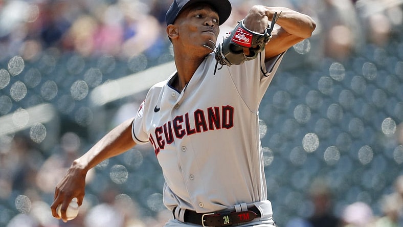 Jun 4, 2023; Minneapolis, Minnesota, USA; Cleveland Guardians starting pitcher Triston McKenzie (24) throws to the Minnesota Twins in the second inning at Target Field. Mandatory Credit: Bruce Kluckhohn-USA TODAY Sports
