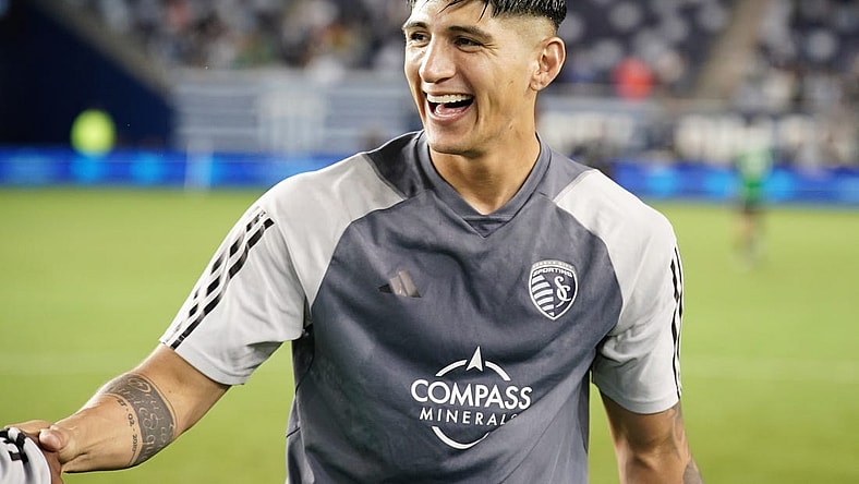 Jun 10, 2023; Kansas City, Kansas, USA; Sporting Kansas City forward Alan Pulido (9) celebrates at the end of the game against the Austin FC at Children's Mercy Park. Mandatory Credit: Denny Medley-USA TODAY Sports