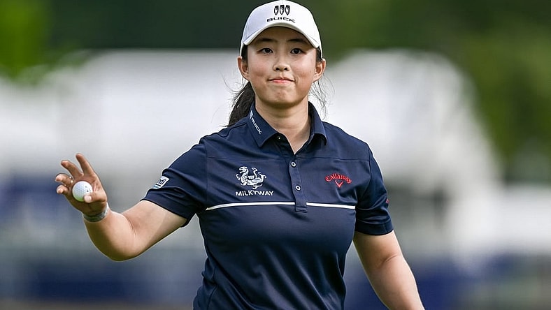 Jun 25, 2023; Springfield, New Jersey, USA; Ruoning Yin reacts on the 18th hole during the final round of the KPMG Women's PGA Championship golf tournament. Mandatory Credit: John Jones-USA TODAY Sports