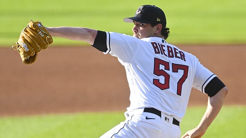 Jul 4, 2023; Cleveland, Ohio, USA; Cleveland Guardians starting pitcher Shane Bieber (57) delivers a pitch in the first inning against the Atlanta Bravesb at Progressive Field. Mandatory Credit: David Richard-USA TODAY Sports