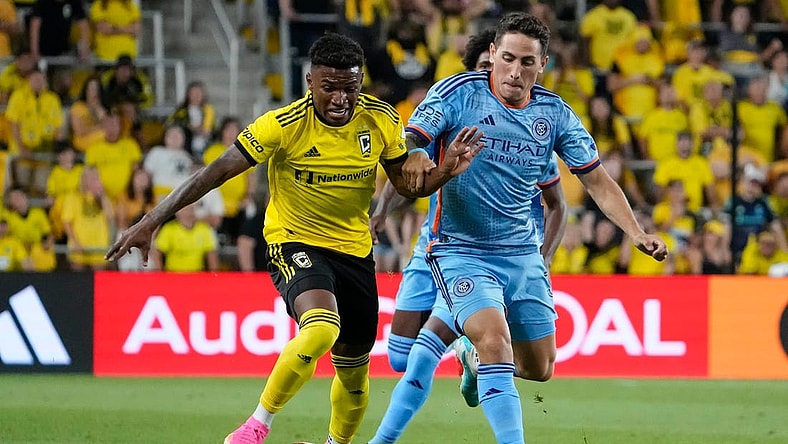 Jul 8, 2023; Columbus, Ohio, USA;  Columbus Crew midfielder Luis Diaz (11) runs past New York City FC defender Braian Cufre (3) during the second half of the MLS soccer match at Lower.com Field. Diaz was brought down by Cufre on the play but no foul was called, resulting in Columbus Crew head coach Wilfried Nancy being given a red card for his protest. The Crew tied 1-1.