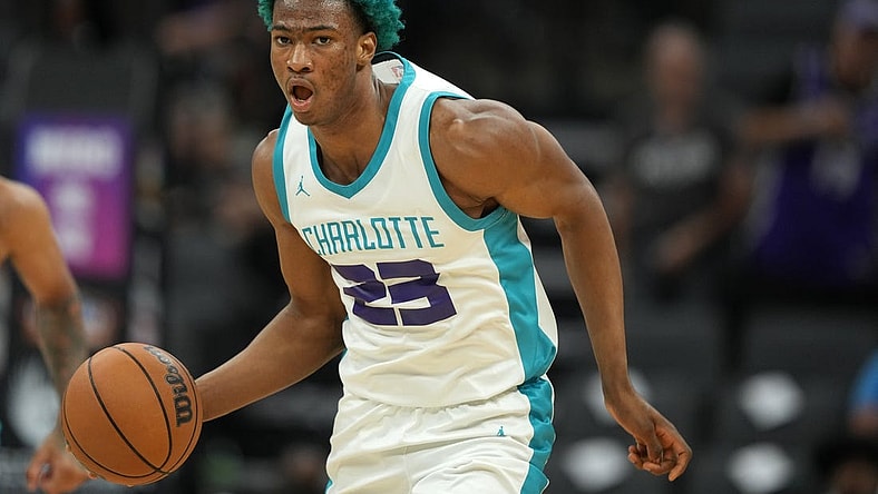 Jul 5, 2023; Sacramento, CA, USA; Charlotte Hornets forward Kai Jones (23) dribbles against the Golden State Warriors during the third quarter at Golden 1 Center. Mandatory Credit: Darren Yamashita-USA TODAY Sports