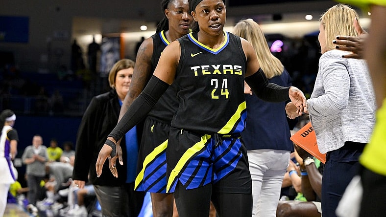 Jul 22, 2023; Arlington, Texas, USA; Dallas Wings guard Arike Ogunbowale (24) leaves the game against the Los Angeles Sparks during the second half at College Park Center. Mandatory Credit: Jerome Miron-USA TODAY Sports