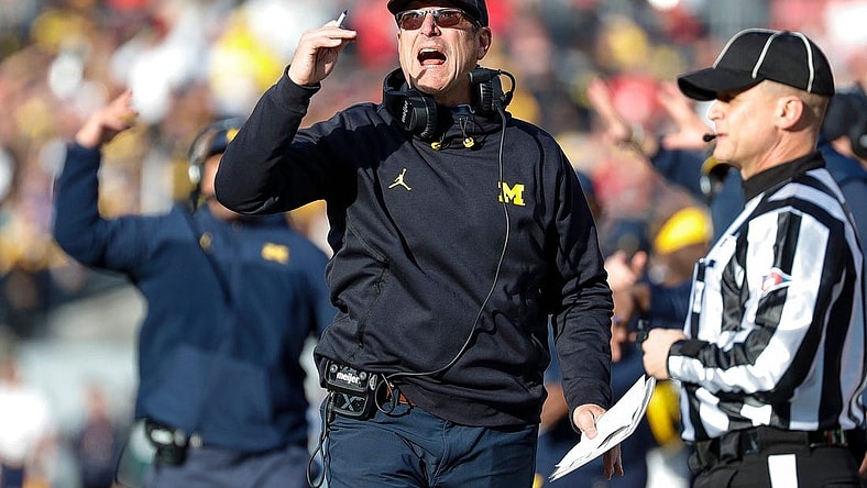 Michigan coach Jim Harbaugh reacts to a play during his team's game against Ohio State at Ohio Stadium in Columbus, Ohio, on Saturday, Nov. 26, 2022.