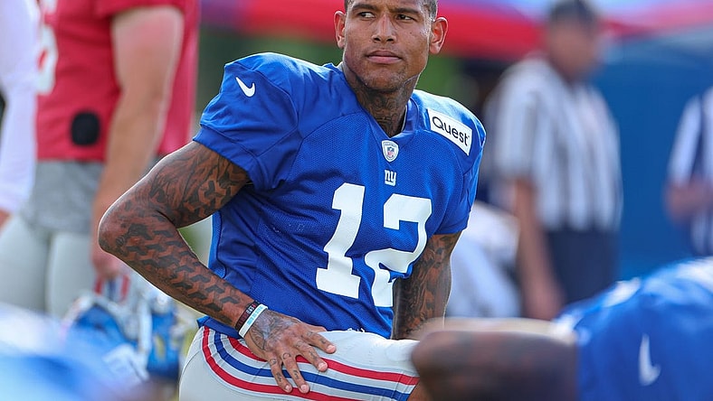 Aug 1, 2023; East Rutherford, NJ, USA; New York Giants tight end Darren Waller (12) stretches during training camp at the Quest Diagnostics Training Facility.  Mandatory Credit: Vincent Carchietta-USA TODAY Sports