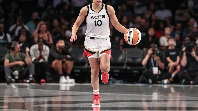 Aug 6, 2023; Brooklyn, New York, USA; Las Vegas Aces guard Kelsey Plum (10) brings the ball up court in the third quarter against the New York Liberty at Barclays Center. Mandatory Credit: Wendell Cruz-USA TODAY Sports