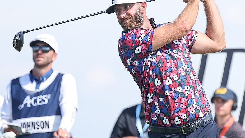 Aug 11, 2023; Bedminster, New Jersey, USA; Dustin Johnson plays his shot from the first tee during the first round of the LIV Golf Bedminster golf tournament at Trump National Bedminster. Mandatory Credit: Vincent Carchietta-USA TODAY Sports