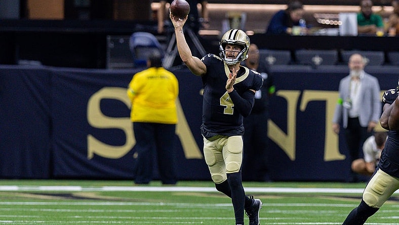 Aug 13, 2023; New Orleans, Louisiana, USA; New Orleans Saints quarterback Derek Carr (4) passes against the Kansas City Chiefs during the first half at the Caesars Superdome. Mandatory Credit: Stephen Lew-USA TODAY Sports