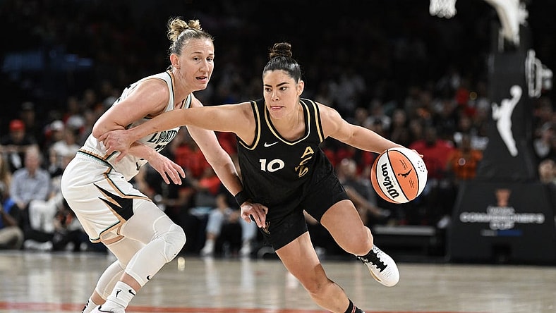 Aug 15, 2023; Las Vegas, Nevada, USA; New York Liberty guard Courtney Vandersloot (22) defends against Las Vegas Aces guard Kelsey Plum (10) during the fourth quarter at Michelob Ultra Arena. Mandatory Credit: Candice Ward-USA TODAY Sports