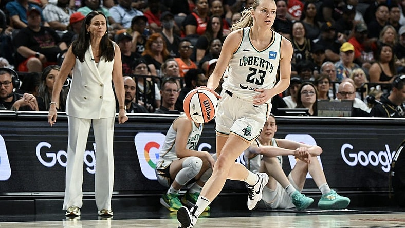 Aug 15, 2023; Las Vegas, Nevada, USA; New York Liberty guard Marine Johannes (23) dribbles up the court against the Las Vegas Aces at Michelob Ultra Arena. Mandatory Credit: Candice Ward-USA TODAY Sports